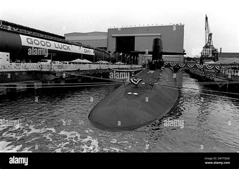 Crewmen Stand Near The Sail Of The Nuclear Powered Ballistic Missile Submarine Uss Ohio Ssbn