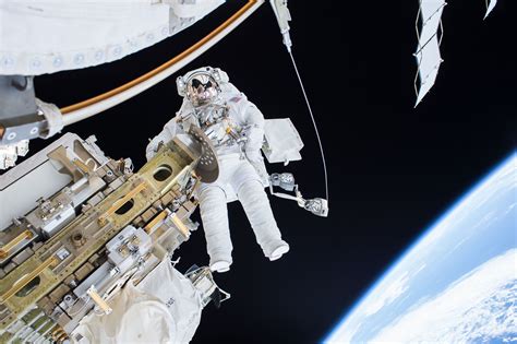 Watch NASA Astronauts Spacewalk To Install A New Dock For The