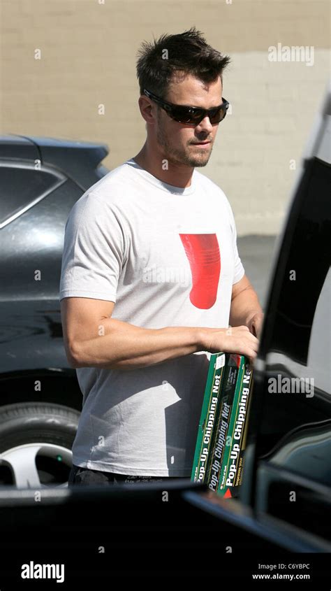 Josh Duhamel Stops At A Gas Station To Refuel His Gmc Sierra Truck He