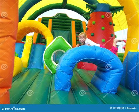 Child Jumping In Bouncy Castle Stock Image Image Of Child Colorful