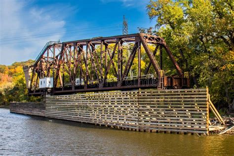 Railroad Bridge Along The Shore Of The Mississippi River Stock Photo