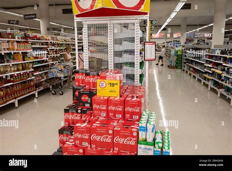 Australian Supermarket Interior Coca Cola Drinks In Red Boxes On