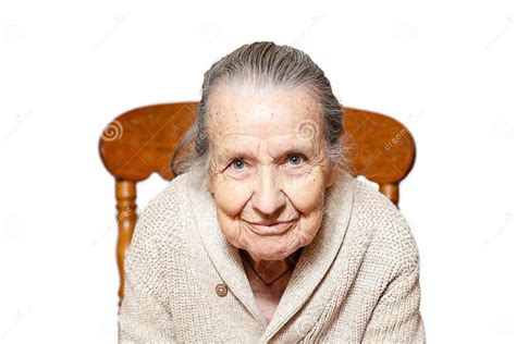 Portrait Of Gray Haired Elderly Woman Grandmother Sitting On Vintage