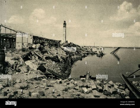 Dunkirk France Harbour Station And Lighthouse Surrounded By Rubble