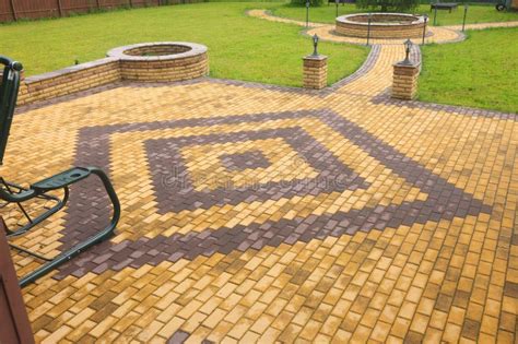 Paved With Tiles Path In The Park Paving Slabs And Lanterns In A Park