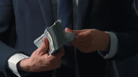 Formally Dressed Man Counting Us Dollar Bills Close Up Stock