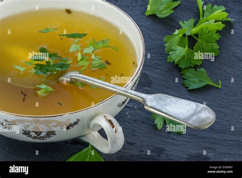 Clear chicken soup with noodles Stock Photo - Alamy