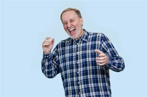 Happy Mature Man Is Laughing Hard Out Loud Stock Photo Image Of