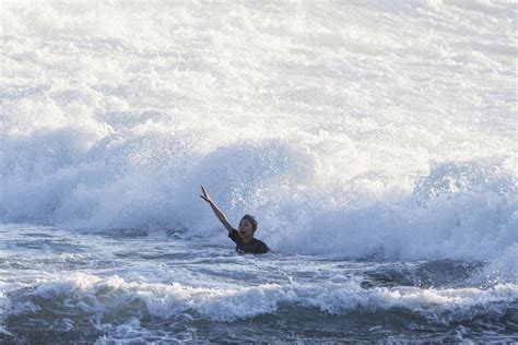 Dramatic Moment Drowning Swimmer Is Saved By Lifeguards After Getting