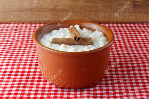 Premium Photo | White corn cooked with milk known as canjica, canjicã â ...