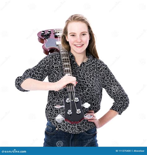 Fille De L Adolescence Blonde Et Guitare Basse Sur Le Fond Blanc Dans Le Studio Photo Stock