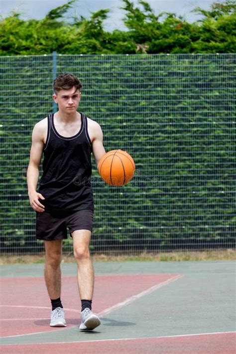 Teenage Boy on a Basketball Court Stock Image - Image of basket, america: 100109747