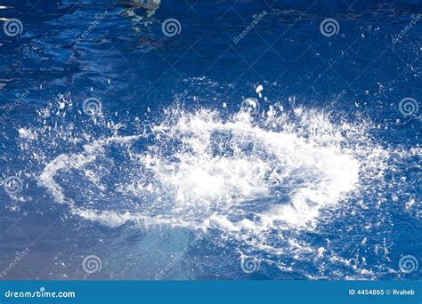 Big Splash In Dark Blue Water Royalty Free Stock Photo Image 4454865