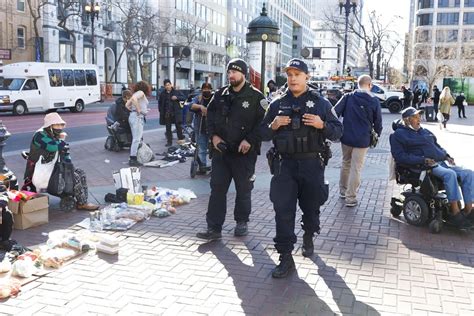 Sfpd Officers Walking Through U N Plaza