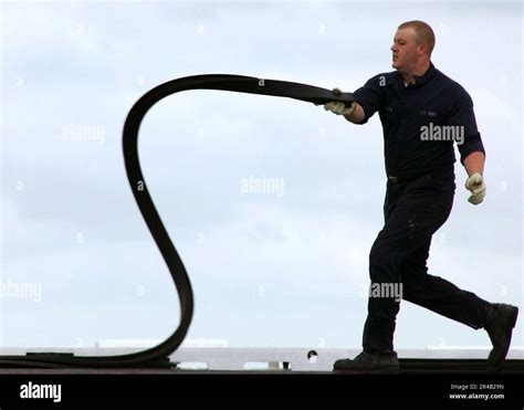 US Navy A Sailor Assigned To Air Department Aboard The Nimitz Class