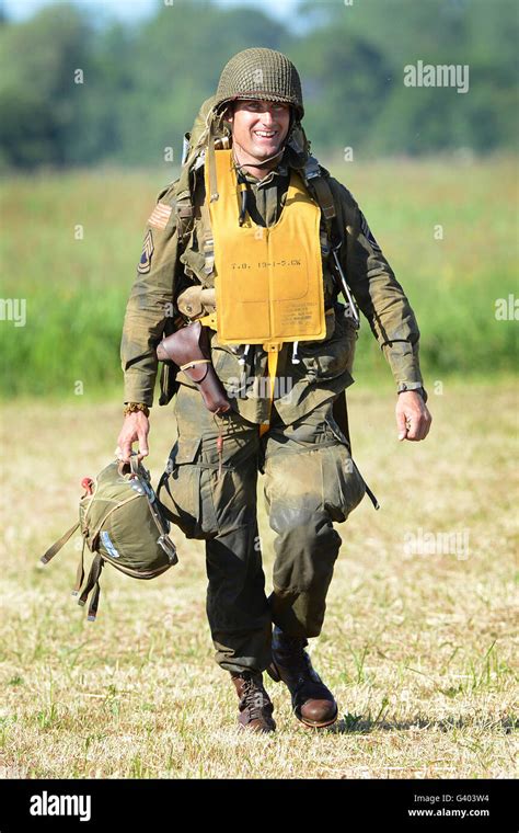 A French paratrooper donning a vintage American World War II ...