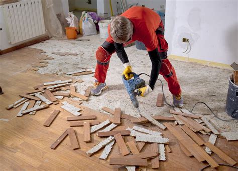 Parquet In Wood Glued To The Slab Removed With An Electric Demolition