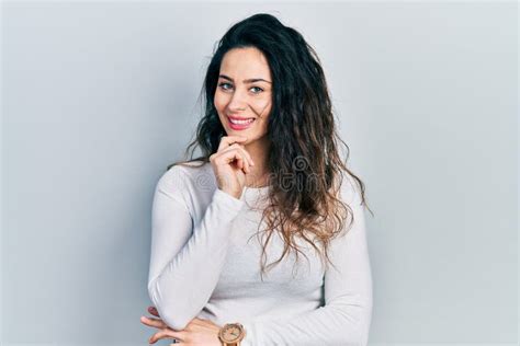 Young Hispanic Woman Wearing Casual Clothes Smiling Looking Confident