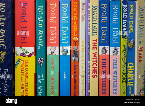 Closeup of a bookshelf of colourful Roald Dahl book covers and spines Stock Photo - Alamy