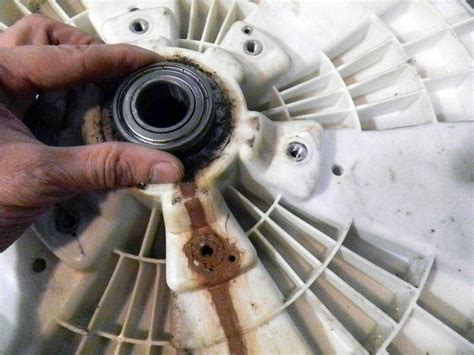 Признаки поломки подшипника в стиральной машине