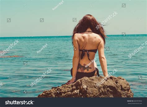 661 Brunette Woman Black Swimwear Sitting On Beach Images Stock Photos Vectors Shutterstock