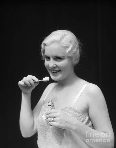 Woman With Toothbrush C 1930s Photograph By H Armstrong Roberts Classicstock