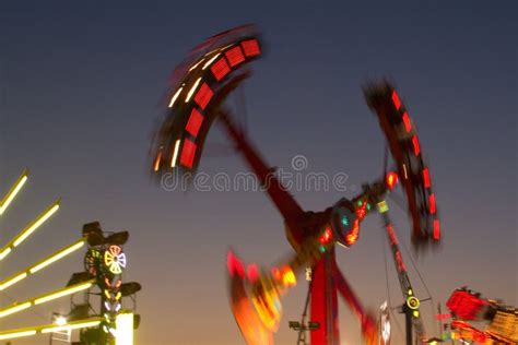 Fair Rides at Night stock image. Image of entertainment - 4837387