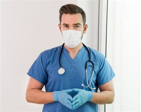 Close Up Nurse Wearing Surgical Mask Free Photo