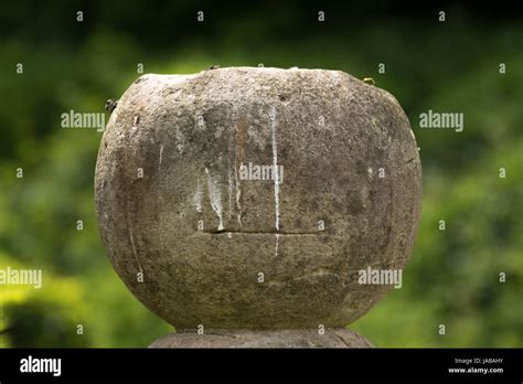 Grumpy Stone Bollard Stock Photo Alamy