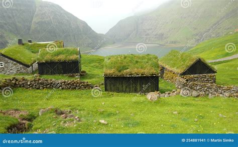 Old Faroese House With Grass Rooftop In The Middle Of Mist Nature