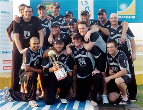 New Zealand Players Pose With The Trophy ESPNcricinfo