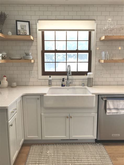 This farmhouse sink pairs nicely with these cabinets and countertops ...