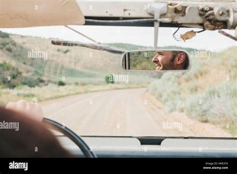 View Through The Windscreen Of An Open Top Jeep Reflection Of The