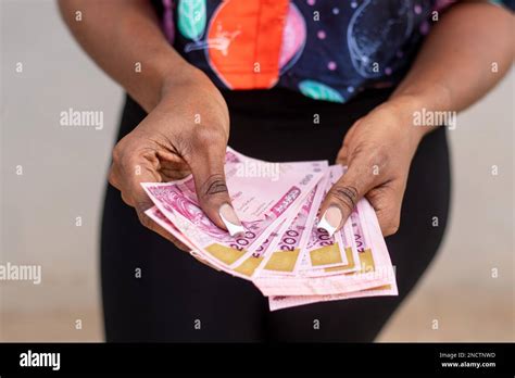 Nigerian Lady Holding The New Naira Notes Stock Photo Alamy