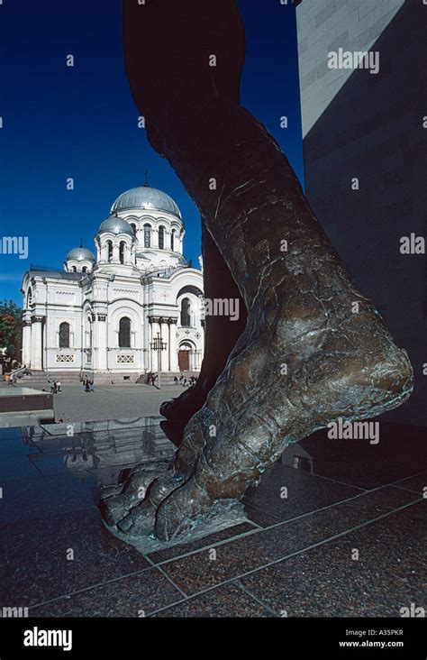 A Leg Of The Naked Man Statue Facing The Church Of St Michael The Archangel Garrison Kaunas
