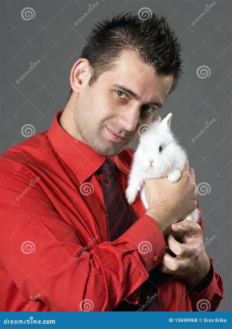 Man Holding Rabbit Stock Photo Image Of Rabbit Business 13690968