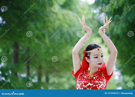 Asian Chinese Beauty Belly Dancer In Red India Stytle Dress Stock Image