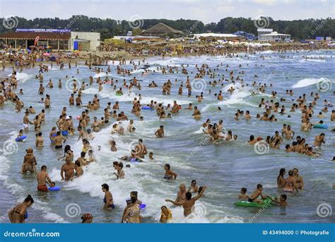 Crowded Beach And People In The Sea Waves Editorial Image Image Of