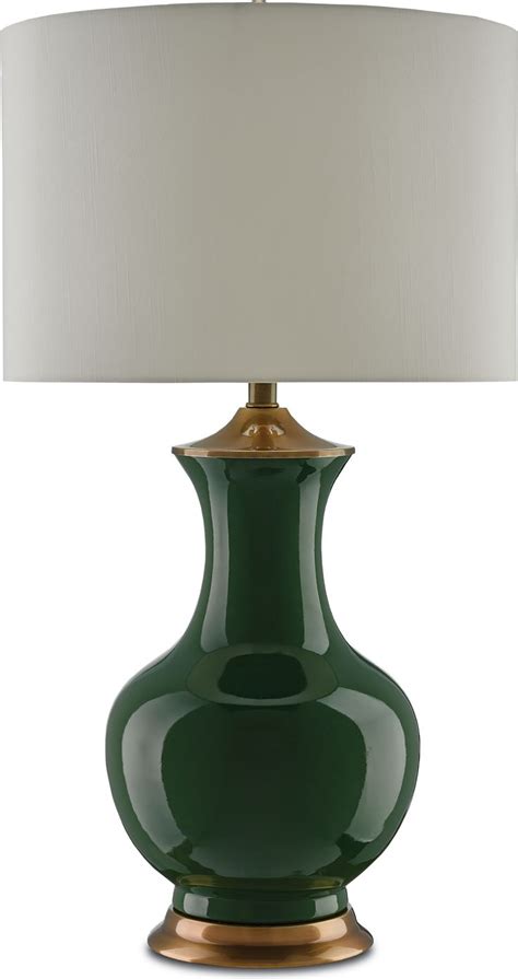 A Green Lamp With A White Shade On It