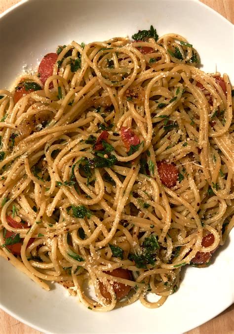 Homemade Spaghetti Aglio E Olio With Parsley Cherry Tomatoes And