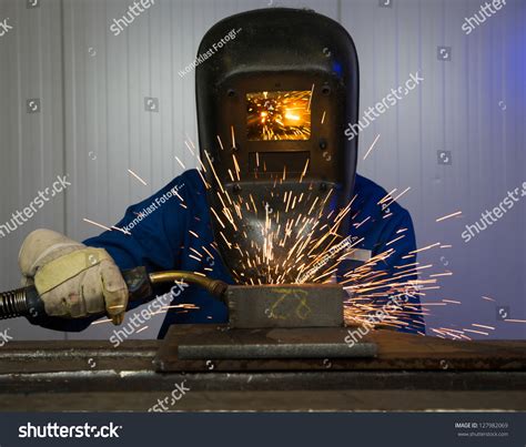 Man With Welding Helmet Welding Steel Stock Photo 127982069 Shutterstock