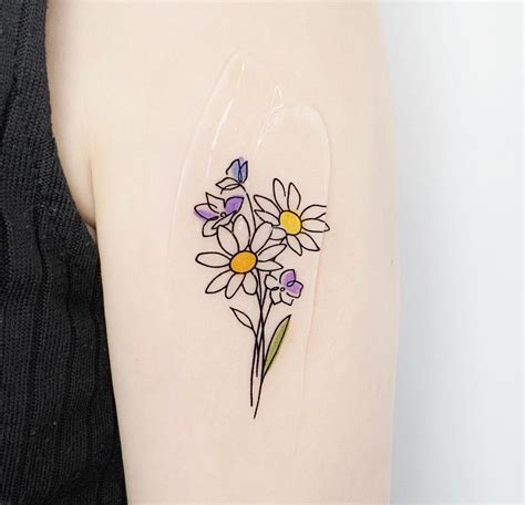 Daisy Tattoo Ideas For Women Photos