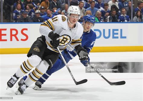 Trent Frederic Of The Boston Bruins Skates Against Pontus Holmberg Of News Photo Getty Images