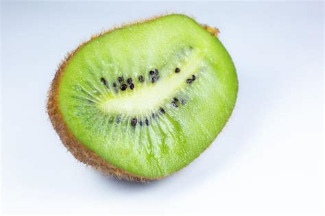 Close Up Photo Of Kiwi On White Background Kiwi Fruit Cut In Half With