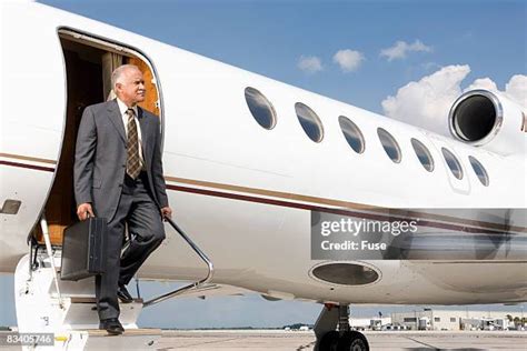 Man Getting Off Plane Photos And Premium High Res Pictures Getty Images