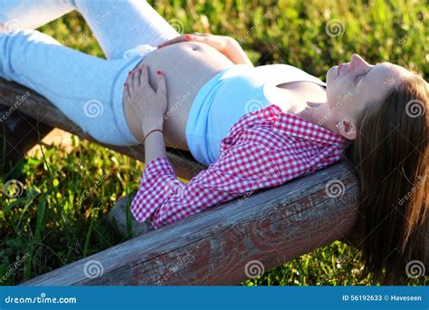 Pregnant Woman Outdoors Stock Image Image Of Pregnant 56192633