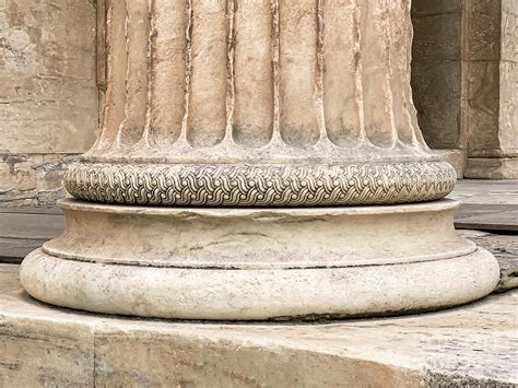 Base Of A Greek Stone Column At The Parthenon Of Acropolis In Athens