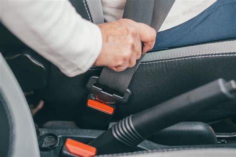 Premium Photo Close Up Of One Mature Woman And Putting On Seat Belt