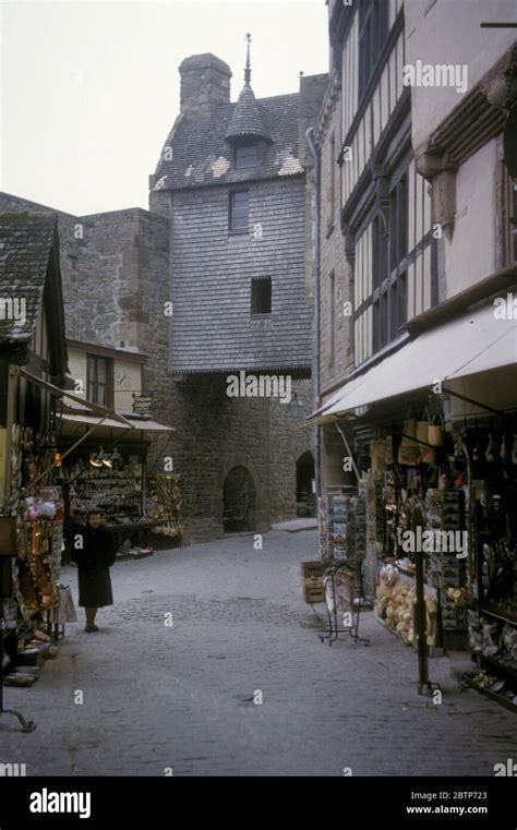Narrow Street With Souvenir Shops In Mont Saint Michel Pictured In 1963