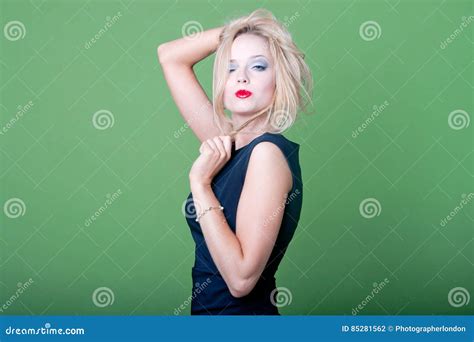 Blonde Businesswoman On Green Background Stock Photo Image Of 2024